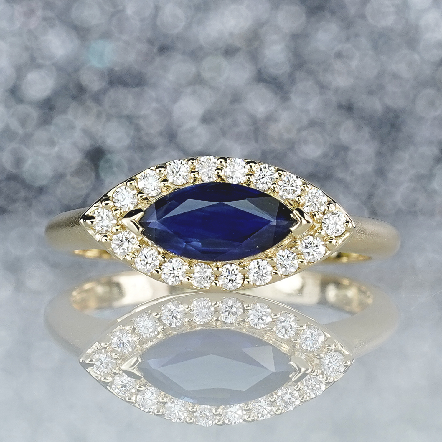 0.99CT Blue Sapphire Marquise East - West & Diamond Ring