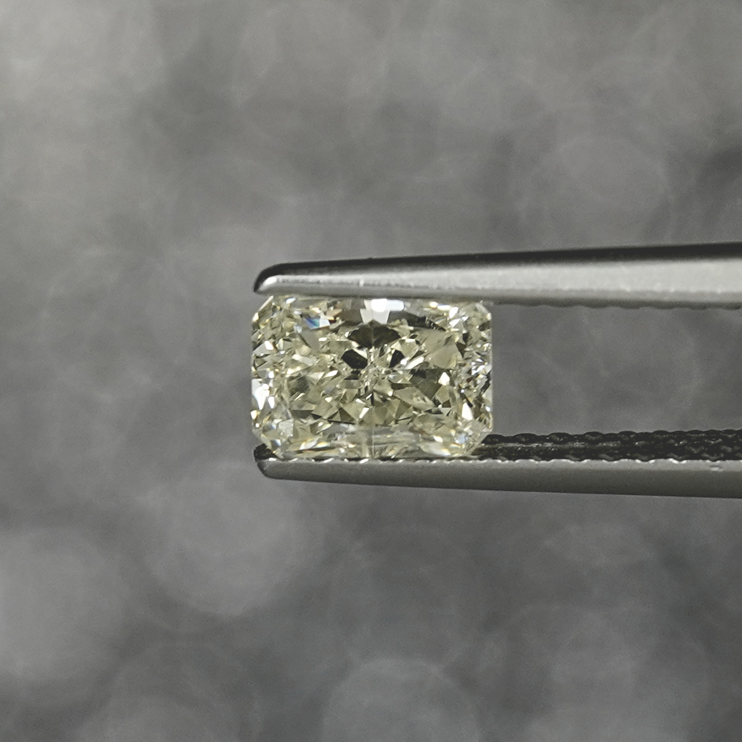 1.00 CT Fancy Yellow Scissor Cut Fancy Diamond