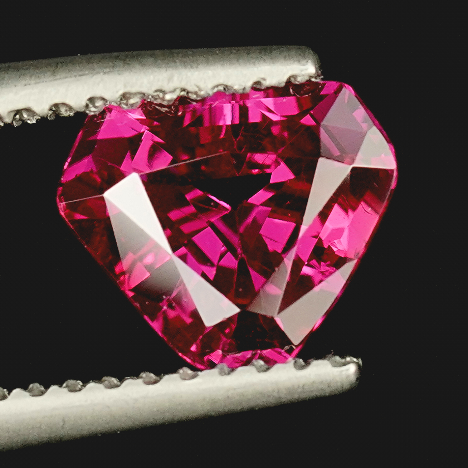 A 1.48CT Burma No Heat Shield Cut Ruby with Pure Purplish Red Color