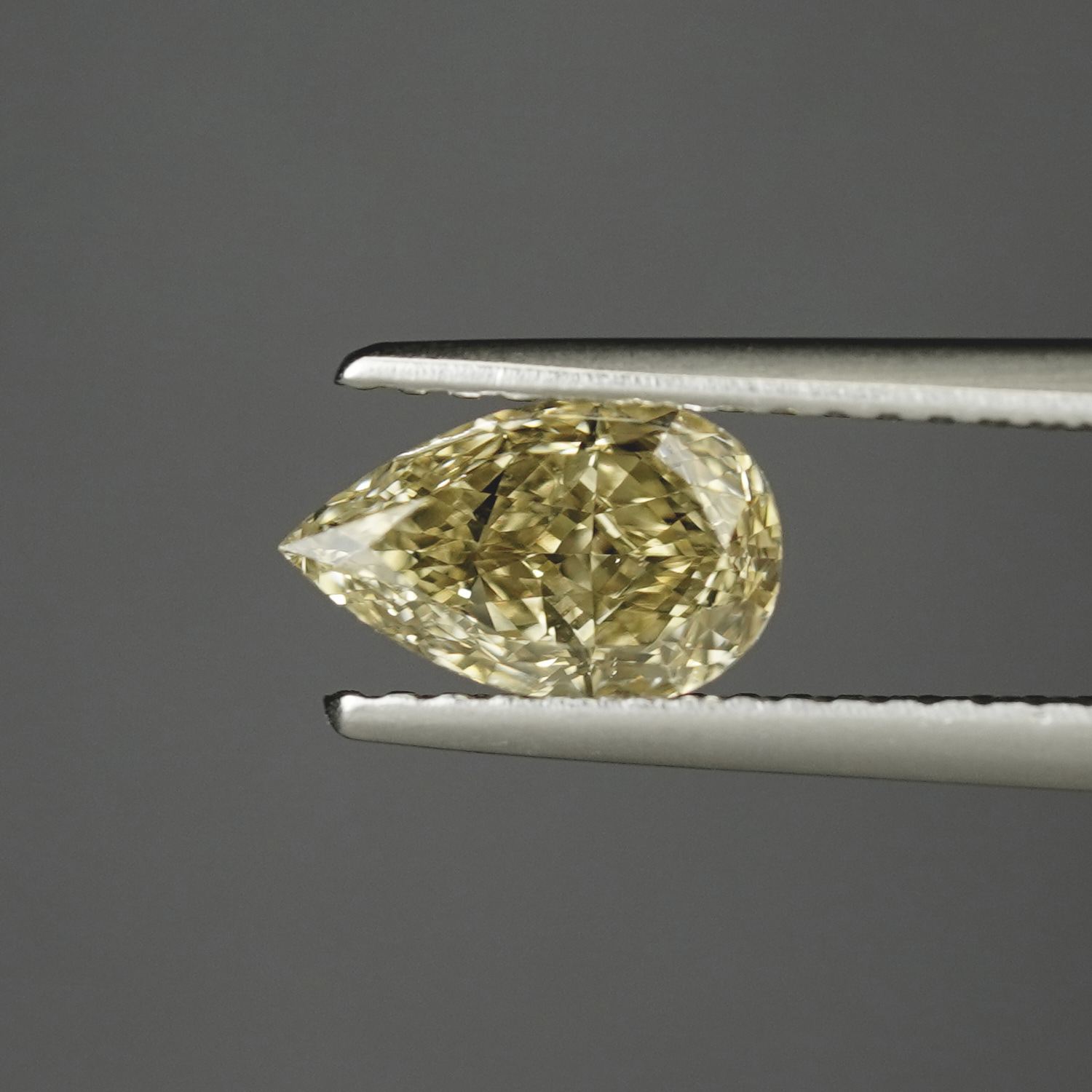 1.01CT Fancy Yellow Pear Shape Fancy Diamond