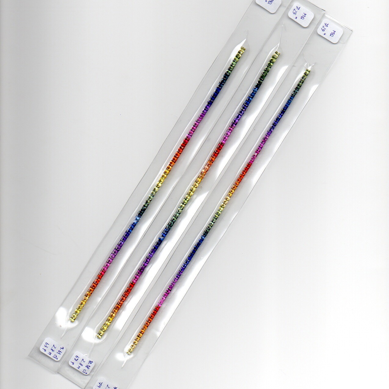 A Stunning 9.61CT 7.5" Array of 2.8mm Princess Cut Rainbow Sapphire