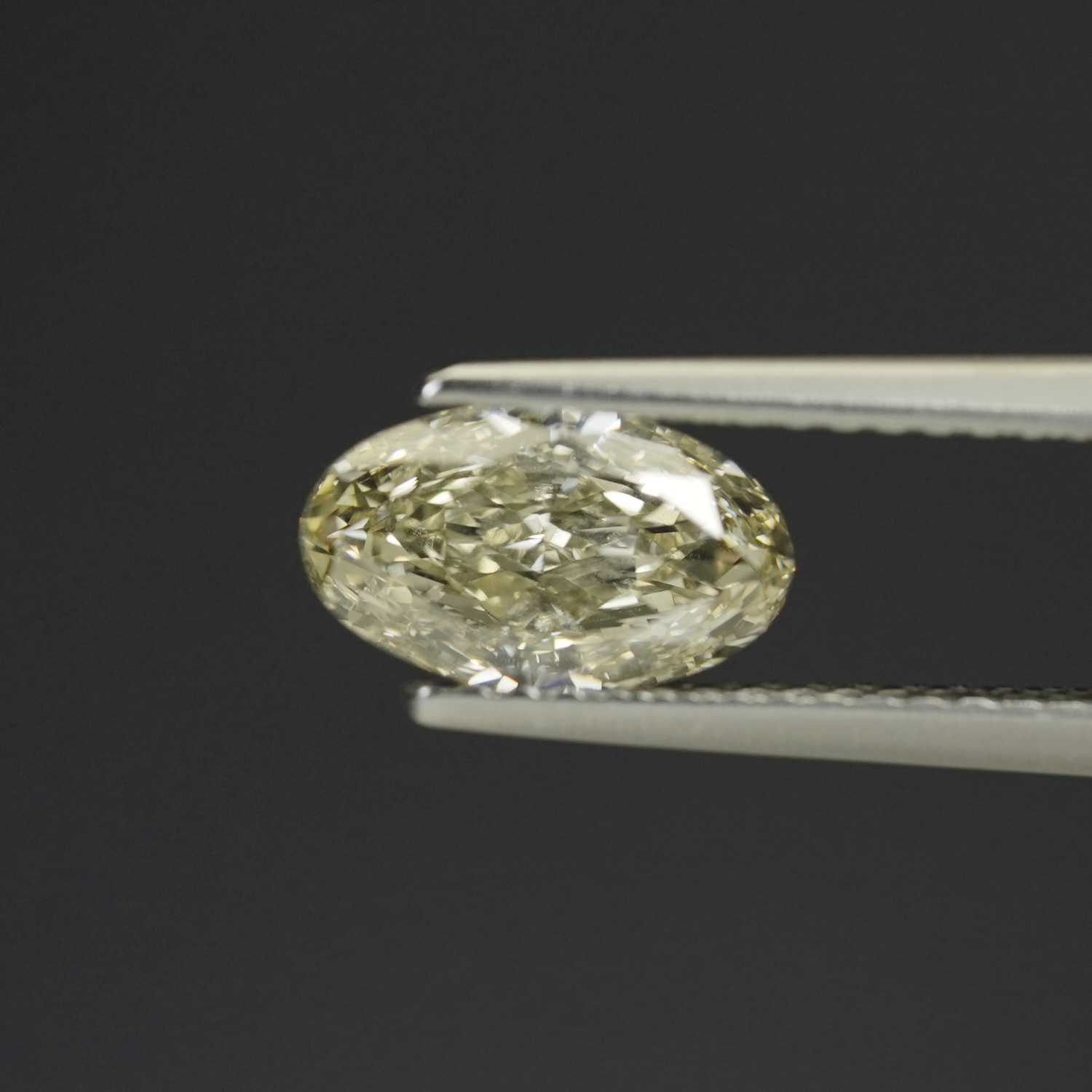 Firey 1.00CT Fancy Yellow Oval Natural Diamond