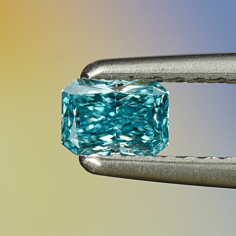 0.28CT Platinum Blue Emerald Cut Fancy Color Lab Dimond