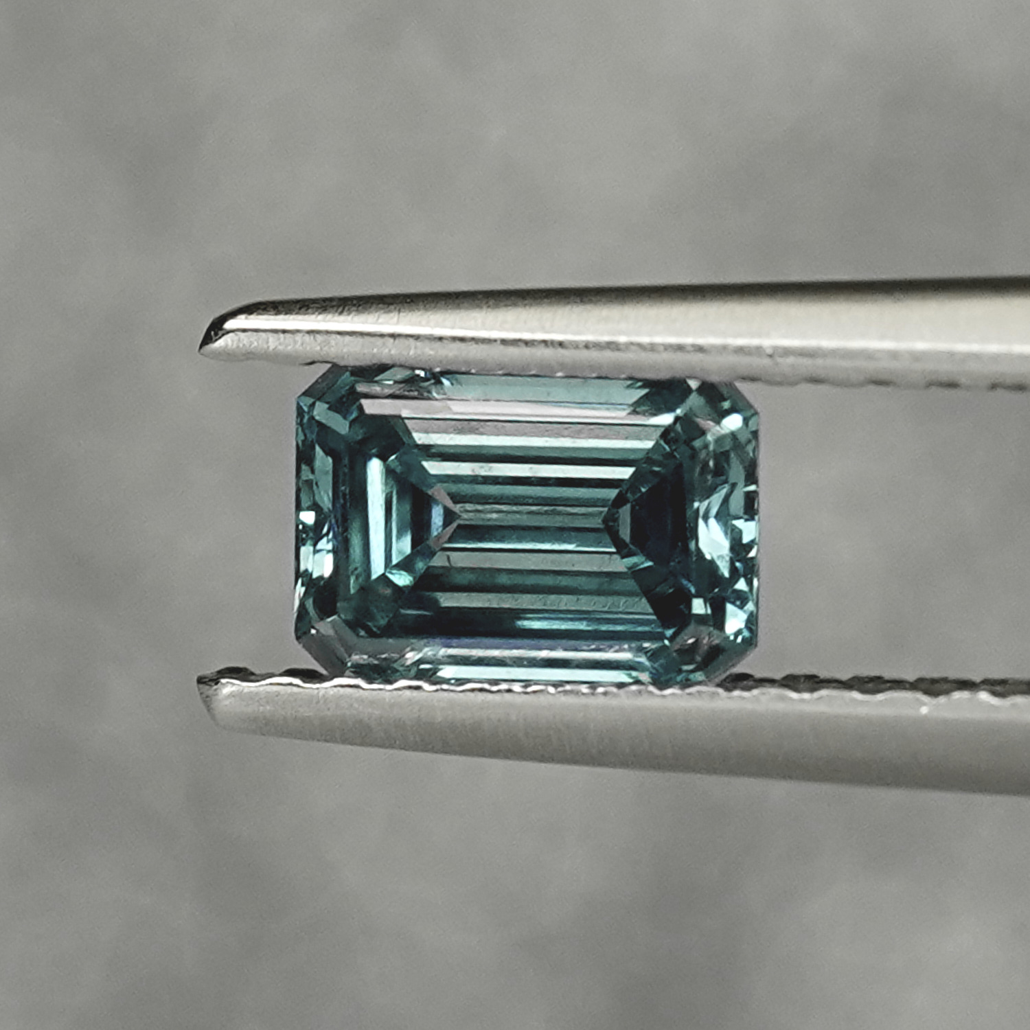 0.64CT Platinum Blue Emerald Cut Fancy Color Lab Dimond